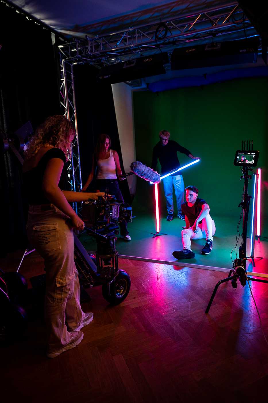 People with light effects shooting